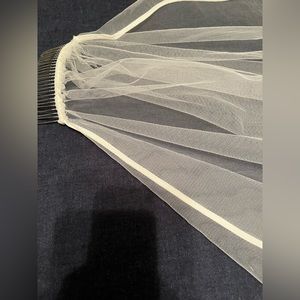 White wedding veil from Wedding Expressions by Geri in MO.